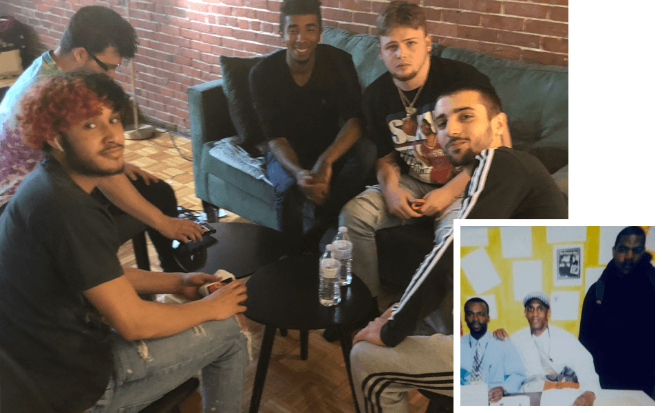 A group of people sitting on top of a couch.